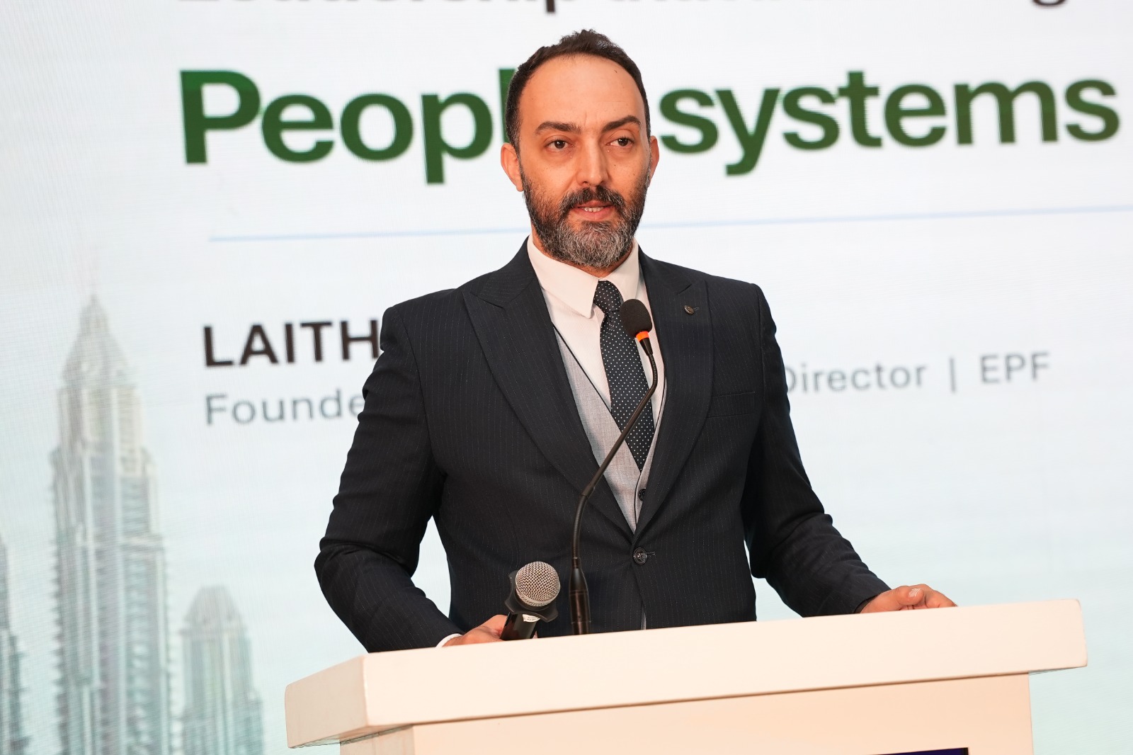 Laith Al Momani presenting on people, systems and organizational growth